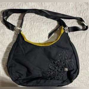 HAIKU Amble Hobo in black with yellow interior